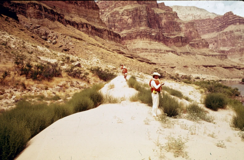 two women with sunglasses on are on the cliffs