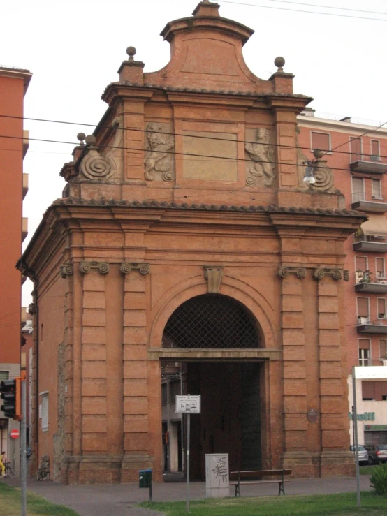 a large brick building has an ornate design