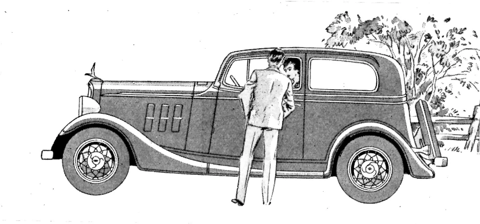 a man standing in the trunk of a car with a woman standing behind him