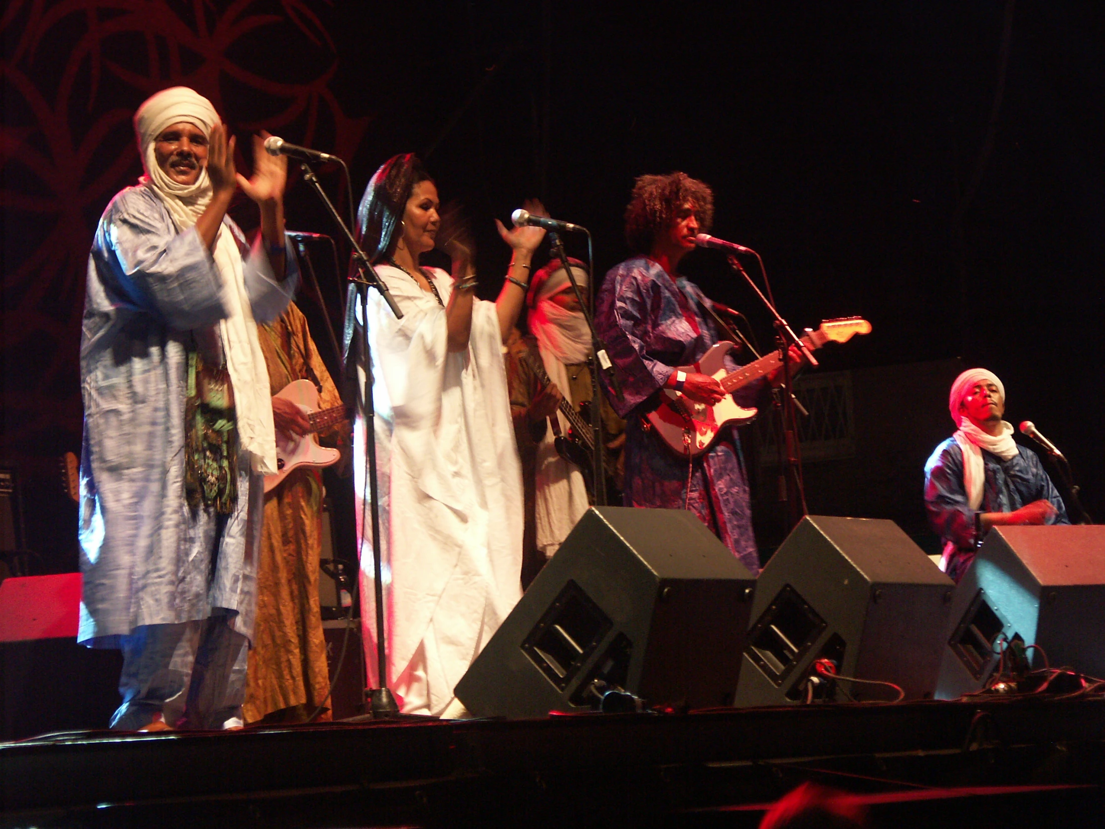 a group of people standing on a stage