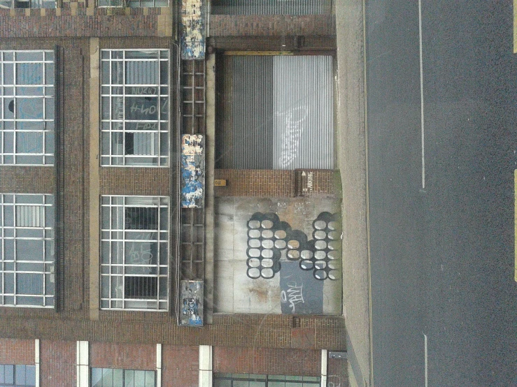 a very large brick building with a lot of windows