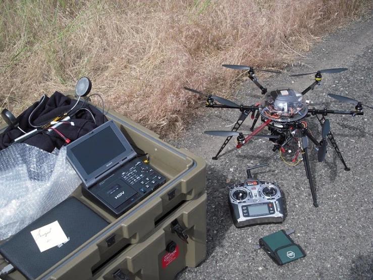 an array of electronics that are sitting on the ground