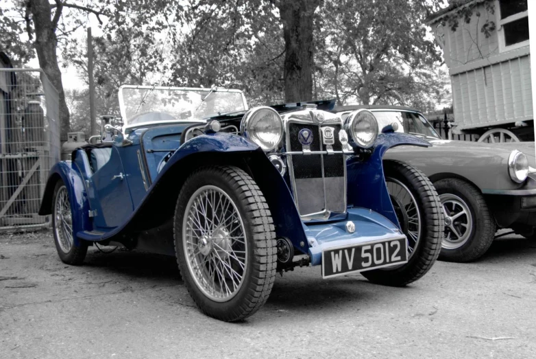 a car with two different engine styles parked next to each other