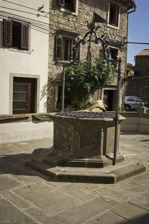 a bench sitting outside on a side walk