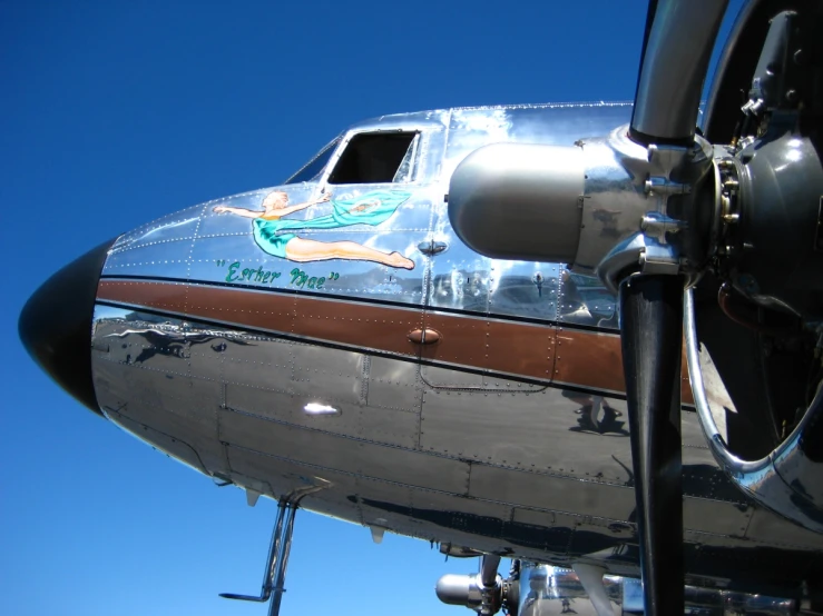 an airplane with an advertit for a company