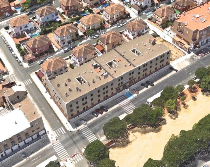 aerial view of building in the city with sand area