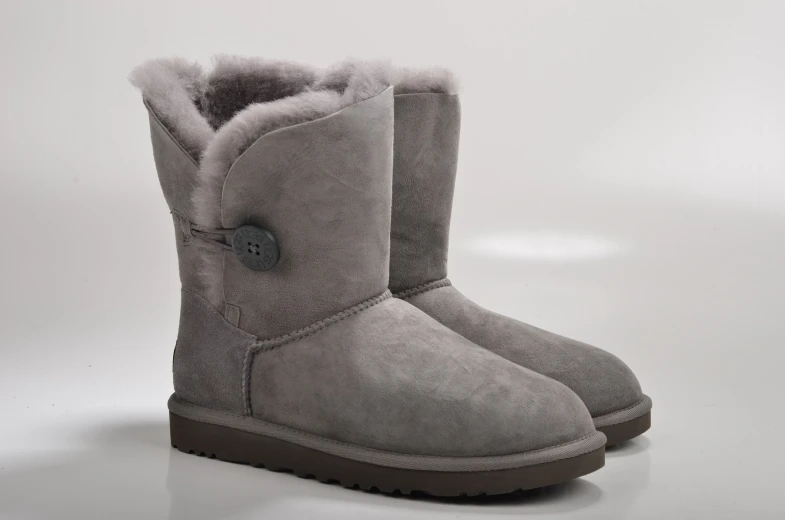 a pair of ugg boots with fur lined inside