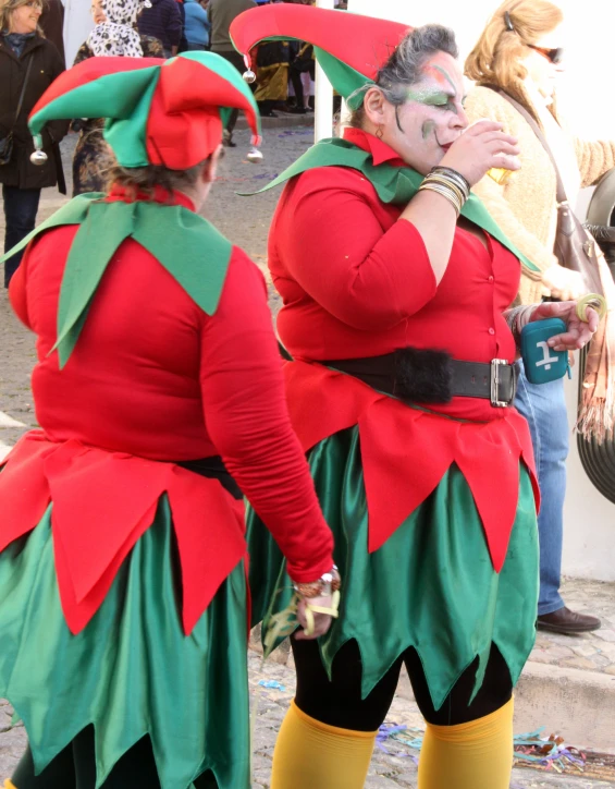 two people in costumes with clown makeup on