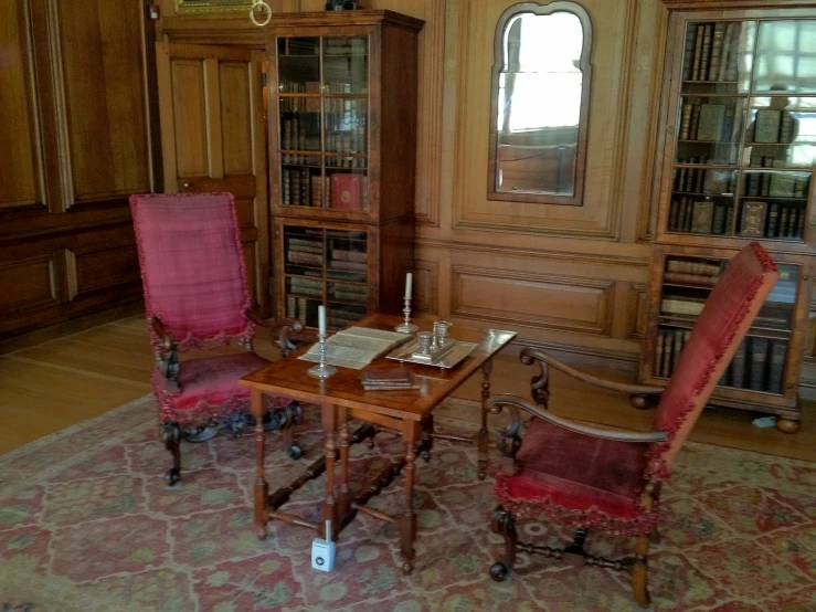 the room features bookshelves and glass windows