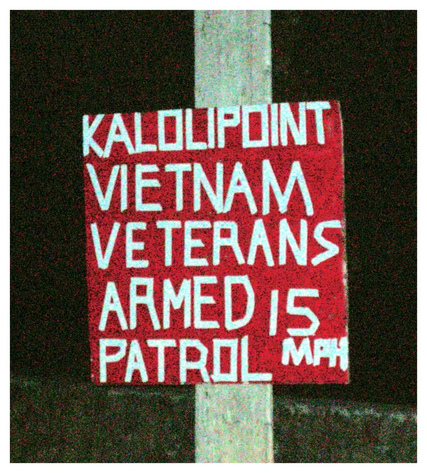 a red and white sign that reads kalolp point vietnam veteran armed is patrol mmh