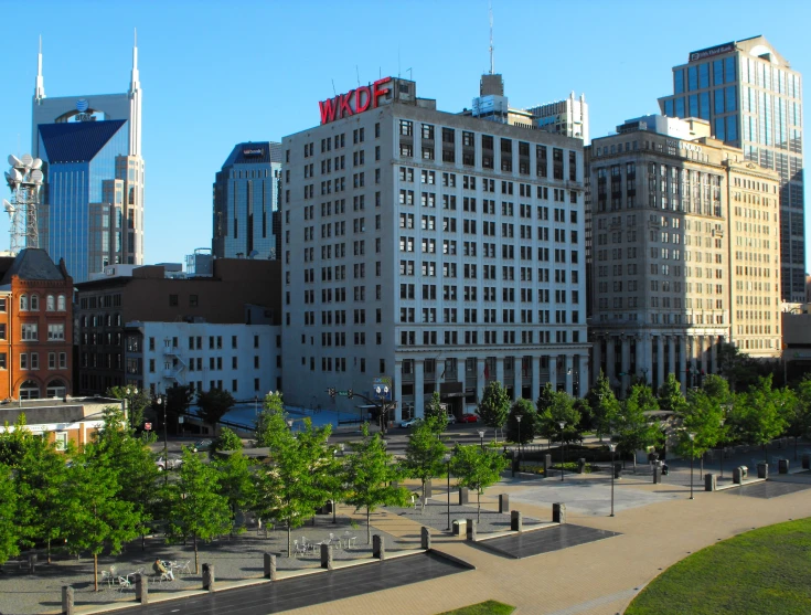 the skyscrs of several buildings, in an urban area