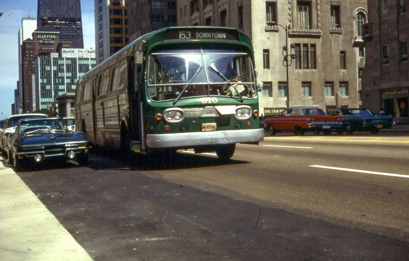 a city bus is moving along a busy street