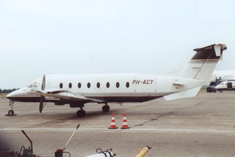 an air plane is sitting on the tarmac