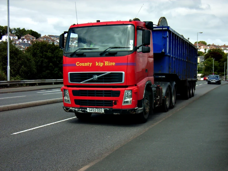 a truck is traveling on a highway in traffic