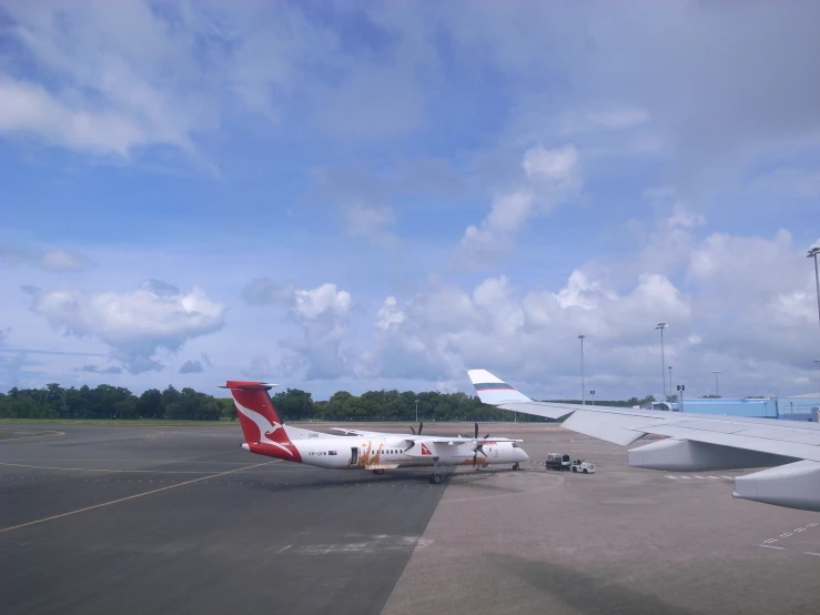 a large jetliner on top of an airport tarmac