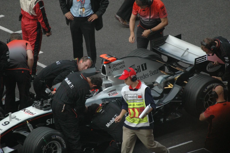 an indy race driver prepares to start out on the track