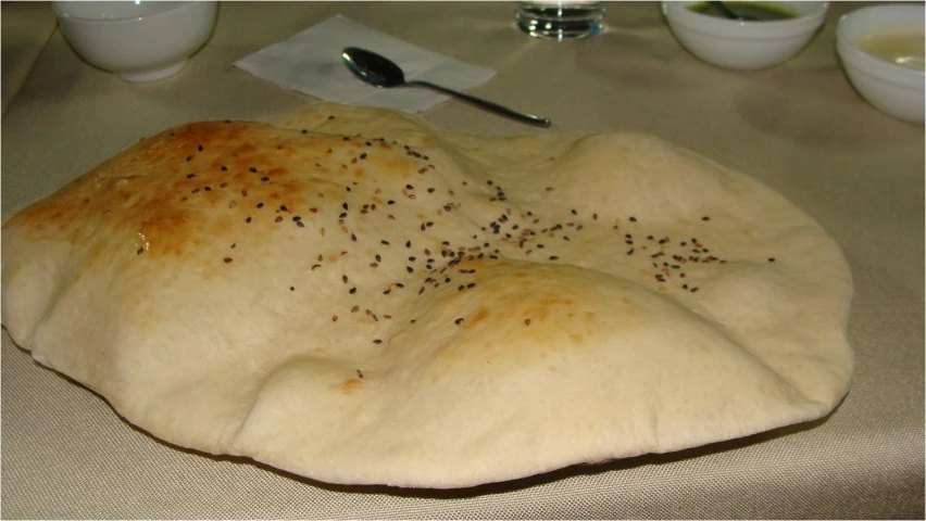 the bread has seeds in it and has been sliced