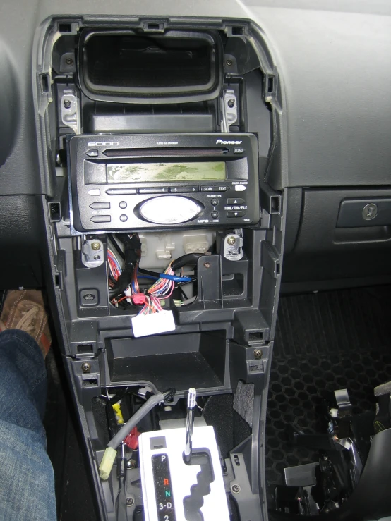 a radio in the passenger compartment of a car