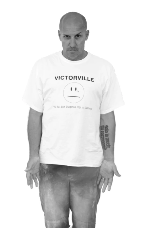 a man with a white shirt that says victoriaville