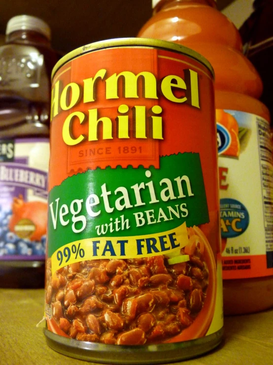 canned vegetables in cans sitting on a table