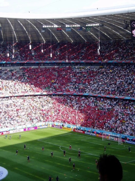 the stadium filled with many people as it stands