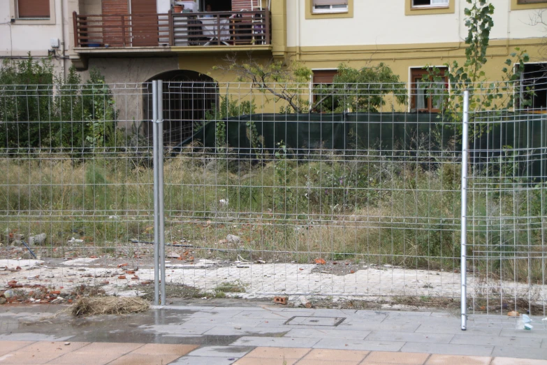 there is a large gate made of wire and mesh