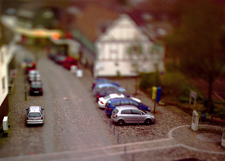 a group of cars parked in a parking lot