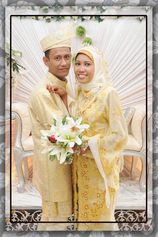 the man and woman are dressed in traditional chinese garb