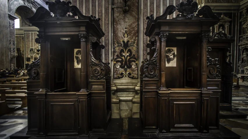 there is an ornate room with two tall wooden cabinets