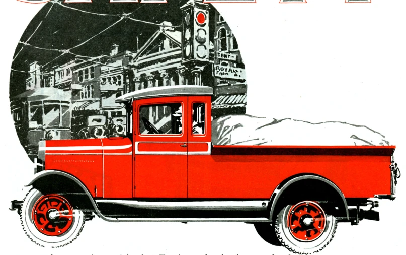 an old red truck with red tires in a city