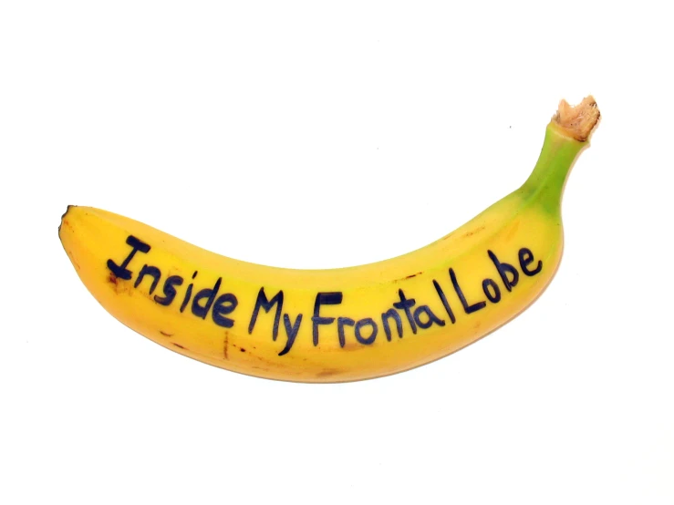 a banana has writing on it in black ink