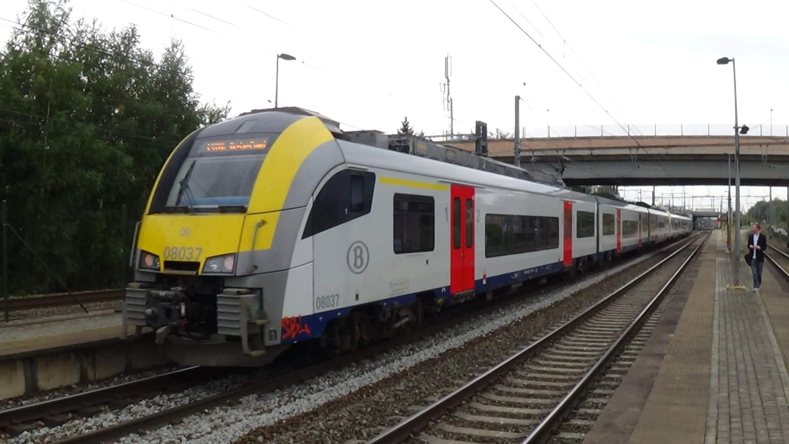 a large long train on a steel track