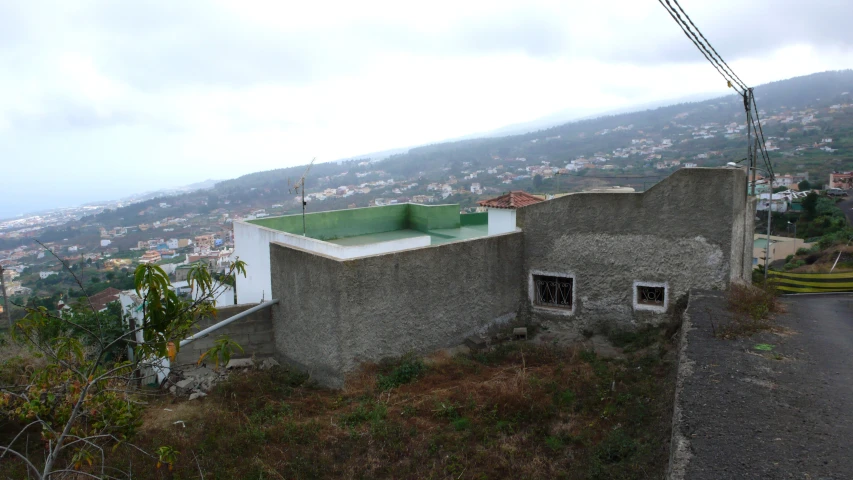 a rooftop with a green roof has a green roof