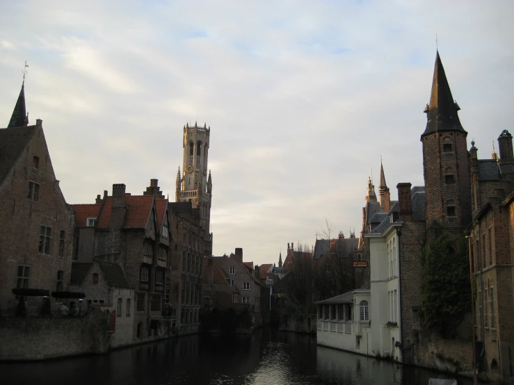 a large city skyline with tall buildings next to the water