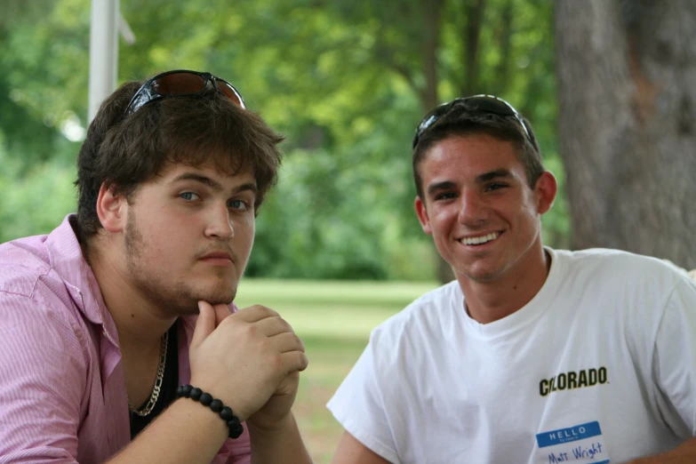 two men are posing for a po together