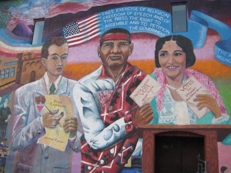 a mural depicts two people and the man is holding up papers