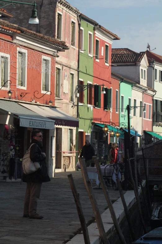 there are many colorful buildings on this street