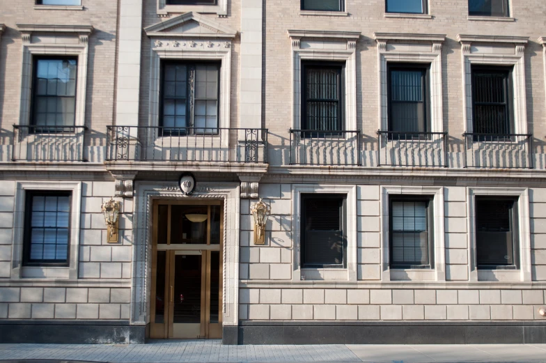 the facade of a large building with lots of windows