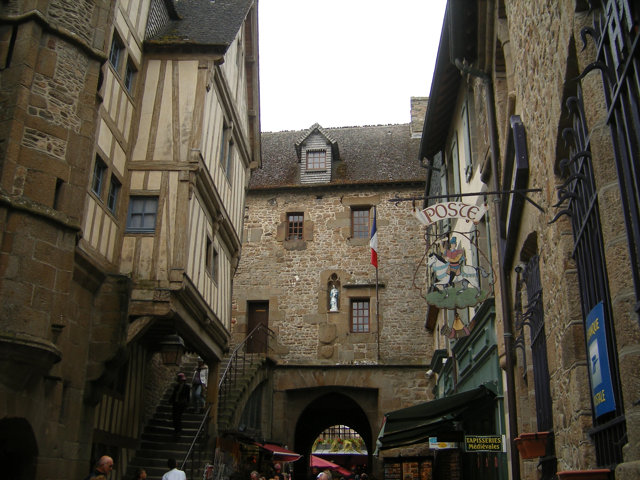 an old building with stone walls and steps