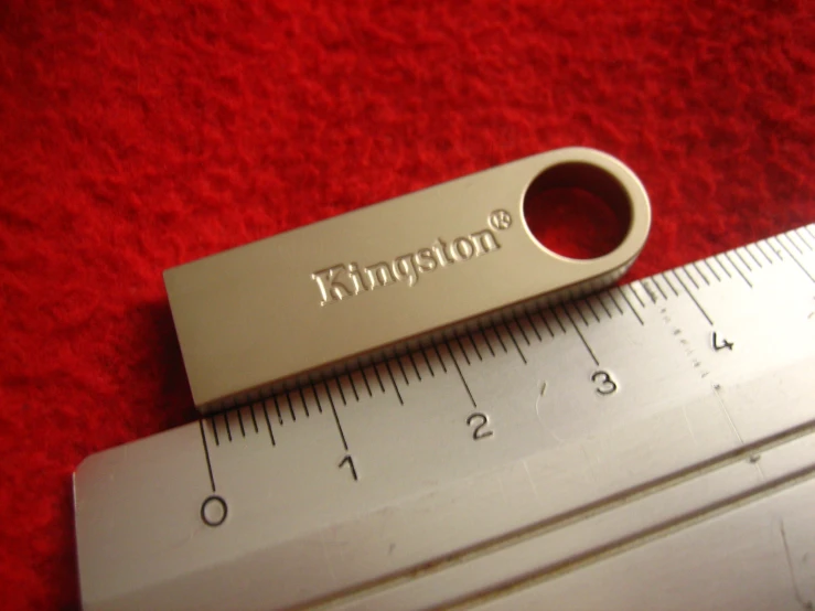 a close - up of a ruler and ruler on a red carpet