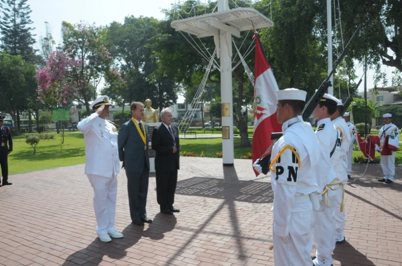 two sailors and their officials in the marine