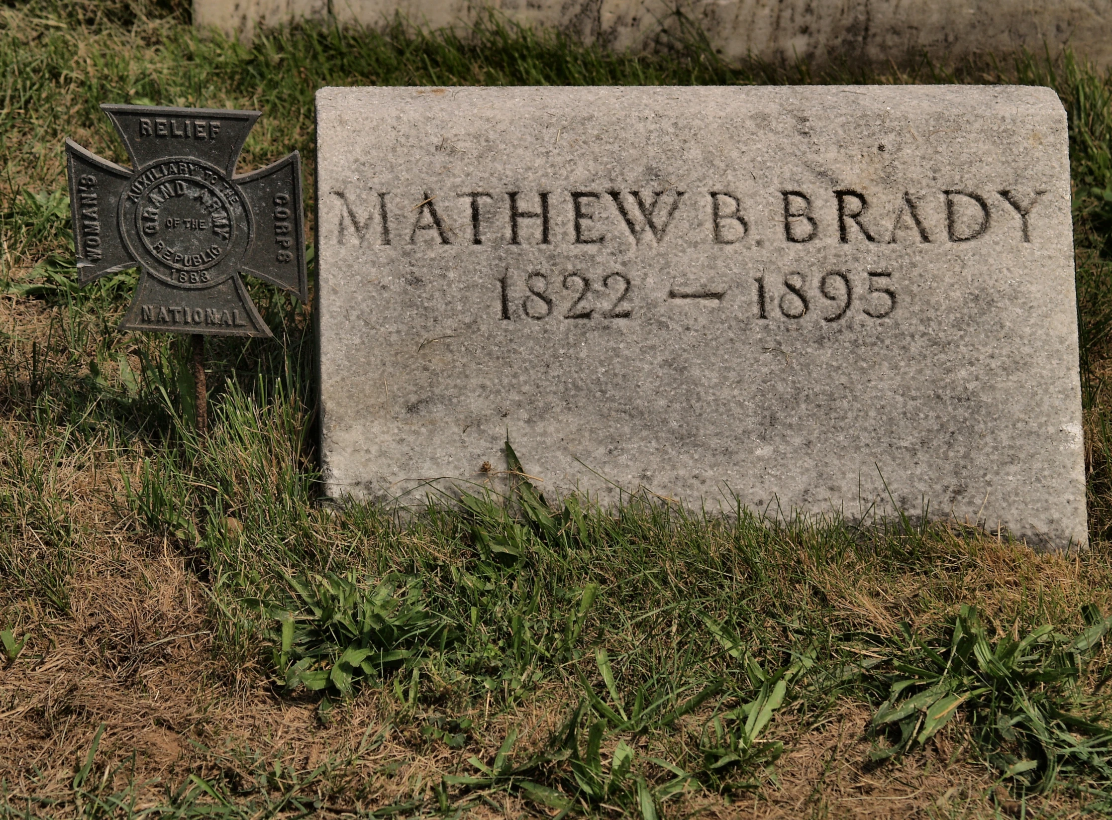 a headstone with the name and date of the death