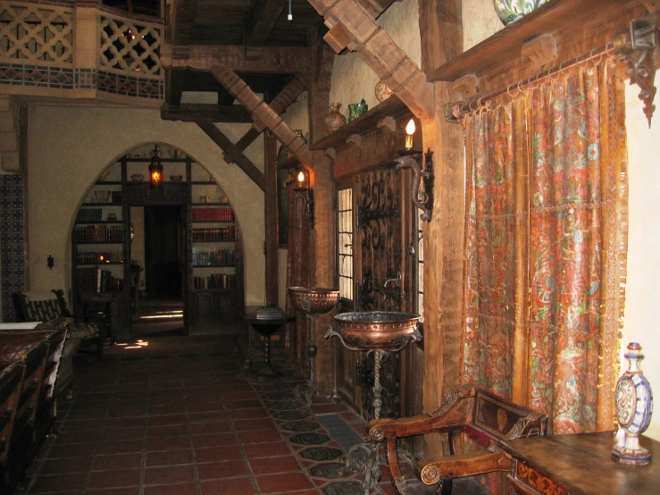 an old hall with a very big tile floor