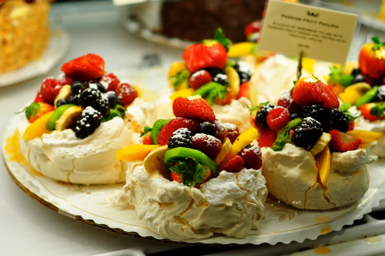 some fruit salad is served on a white plate