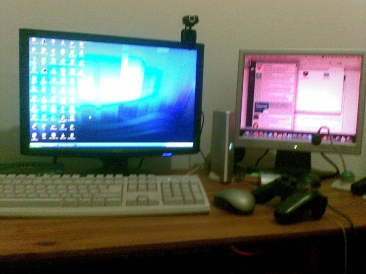 a desktop computer and monitor sitting on top of a desk