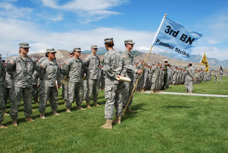 the soldiers are all lined up on the field