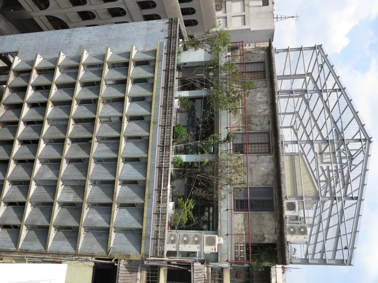 an industrial building has a balcony in the roof