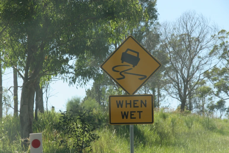 a very funny sign in the grass