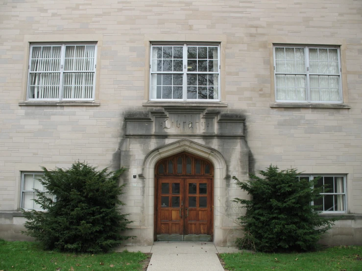 a big building with a long brown door