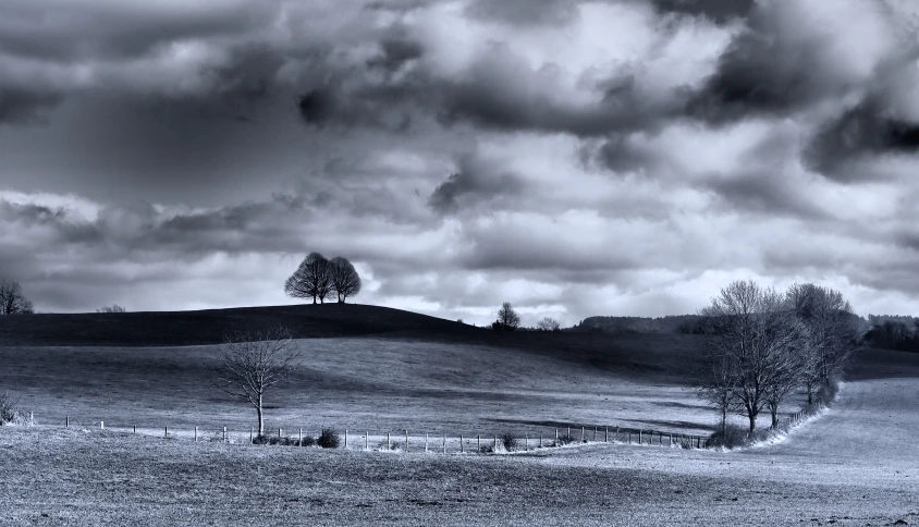 a black and white po of a stormy sky